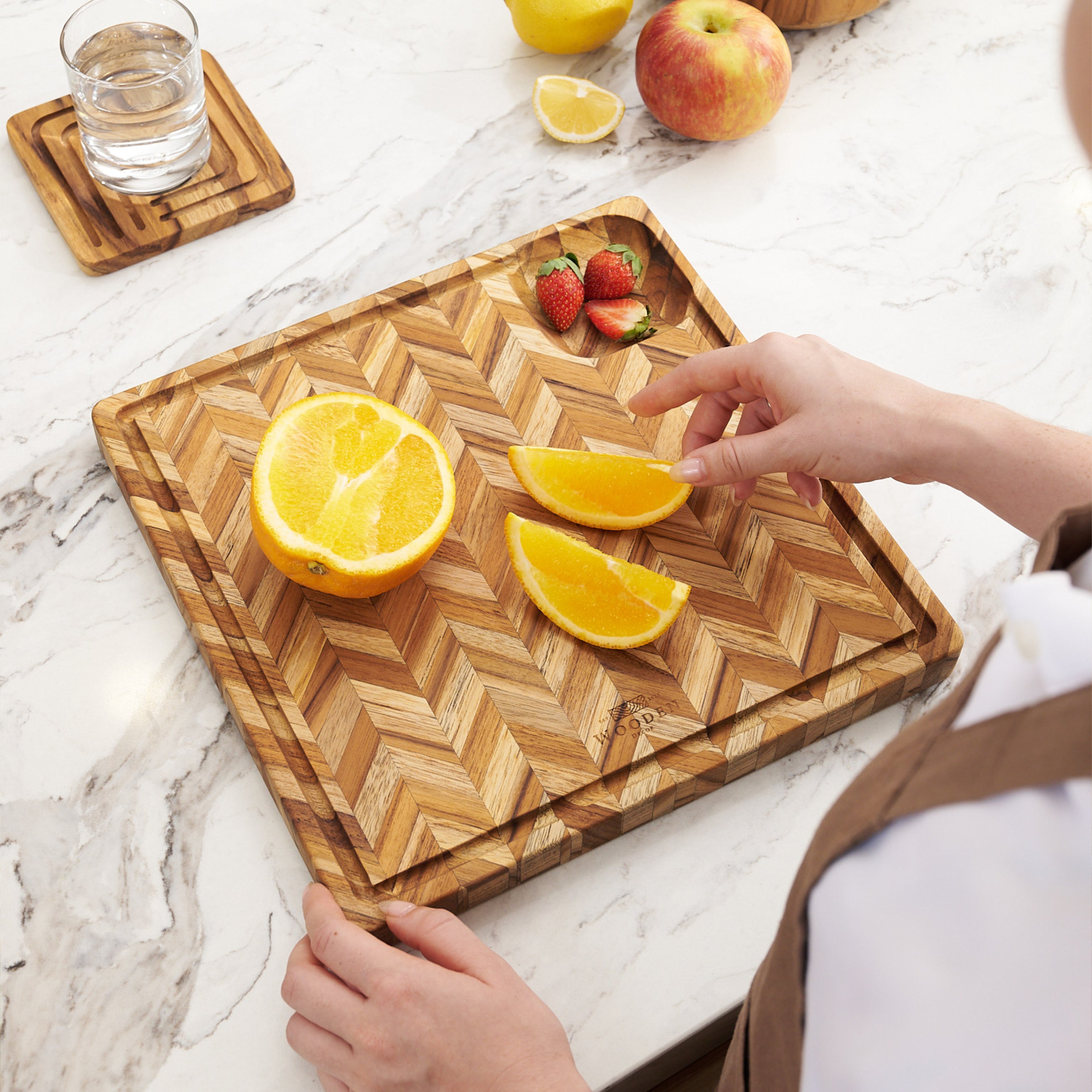 The Easy - Square Herringbone Teak Cutting Board